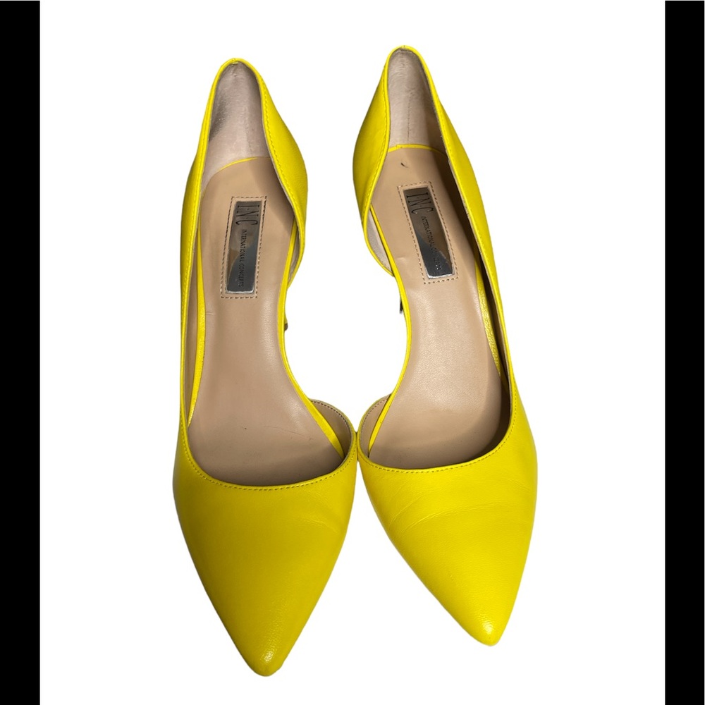 I-N-C International Concepts 
Good Preowned condition
size 9 Yellow Heels
